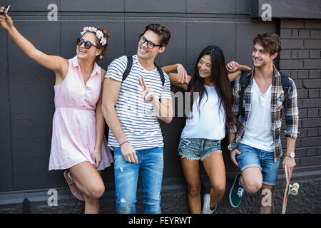 Hip friends taking selfie Stock Photo