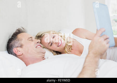 Cute couple using tablet Stock Photo