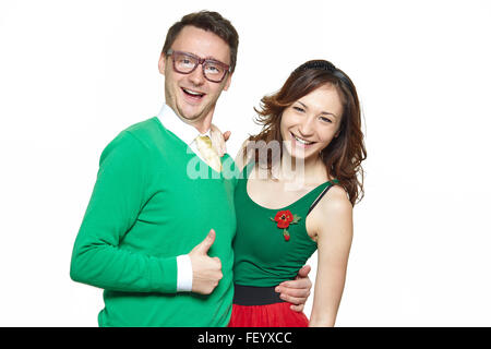 Nerd couple showing thumbs up Stock Photo