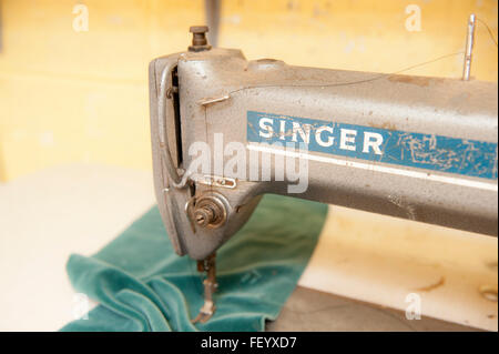 A Singer sewing machine in a sofa factory. Stock Photo