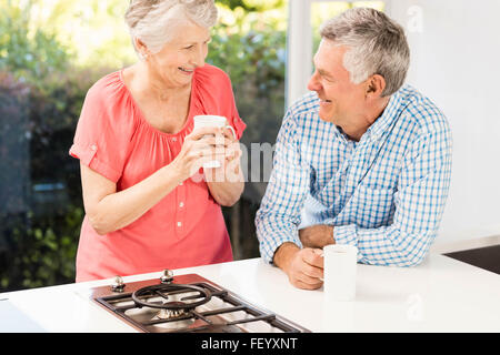 Happy senior couple drinking coffee Stock Photo