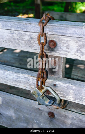 Old rusty padlock and chain. Stock Photo