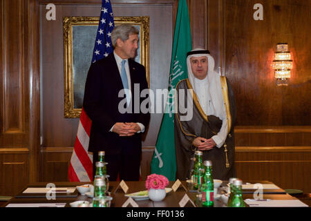 Secretary Kerry Listens as Saudi Arabia Foreign Minister Adel al-Jubeir Answers a Reporter's Question Stock Photo
