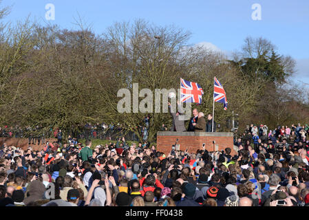 Ashbourne, Derbyshire, UK. 9th Feb, 2016. Barry Greenwood turns up the ball to start the match. Thousands join in the Shrovetide football derby. The goals are three miles apart and the game takes place over two eight hour periods Shrove Tuesday and Ash Wednesday. Credit:  Nigel Spooner/Alamy Live News Stock Photo