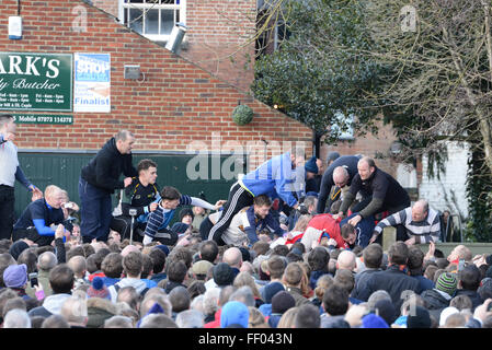 Ashbourne, Derbyshire, UK. 9th Feb, 2016. Players battle for the ball in the hug. Thousands join in the Shrovetide football derby. The goals are three miles apart and the game takes place over two eight hour periods Shrove Tuesday and Ash Wednesday. Credit:  Nigel Spooner/Alamy Live News Stock Photo