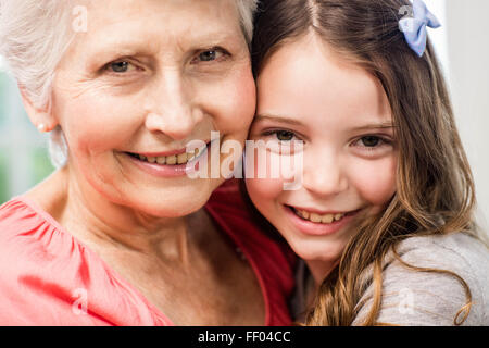 Grandmother and granddaughter embracing Stock Photo