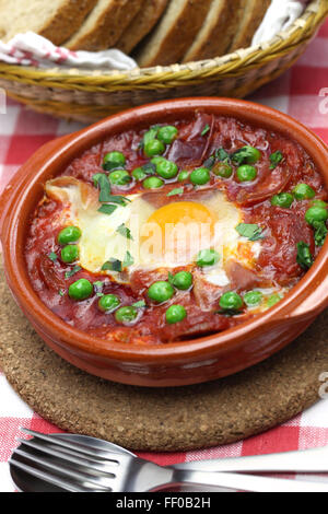 flamenco eggs, huevos a la flamenca, spanish andalusian cuisine Stock Photo