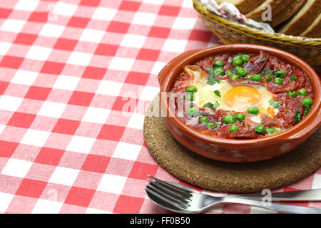 flamenco eggs, huevos a la flamenca, spanish andalusian cuisine Stock Photo