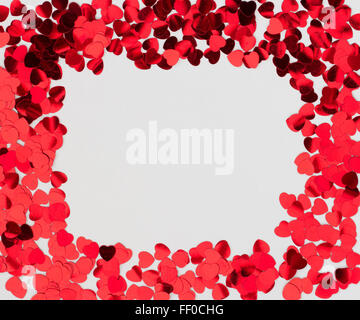A picture frame made from small love hearts isolated on a white background. Stock Photo