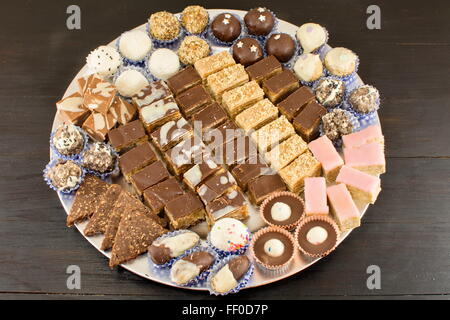 bunch of different candy on a plate Stock Photo