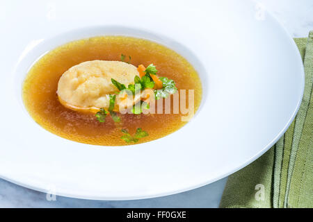 Semolina dumpling soup beef broth strengthen Bouillon meat soup Strong Food eat brew cooking kitchen hot water bone spices parsl Stock Photo