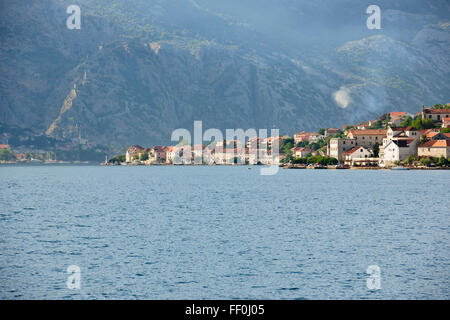 Dobrota,Bay outside Kotor Town,Fortifications snaking up the mountainside, defending the city in ancient times,Kotor,Montenegro Stock Photo
