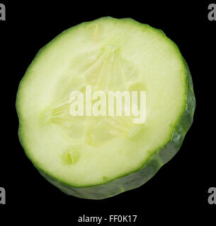 cucumber slice on a black background. Stock Photo