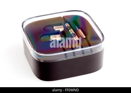 Miniature earphones in the closed plastic box isolated on white Stock Photo