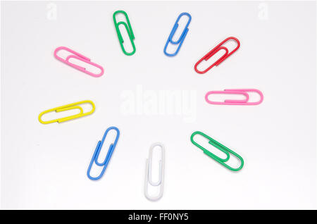 Colorful paper clip isolated on white background. Stock Photo