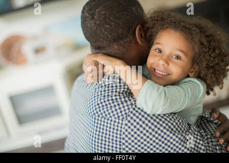 Father and daughter hugging Stock Photo