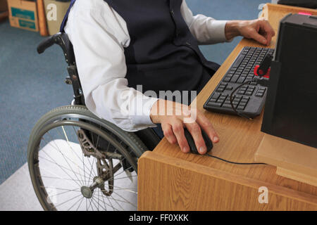 Caucasian businessman working at desk Stock Photo