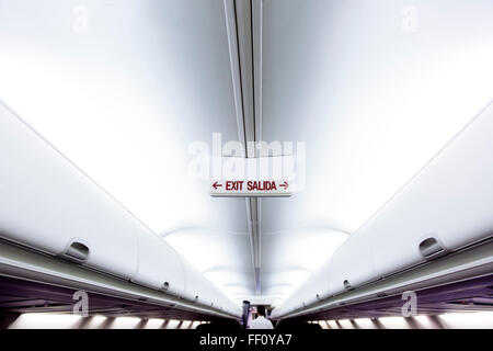 Exit sign in airplane Stock Photo