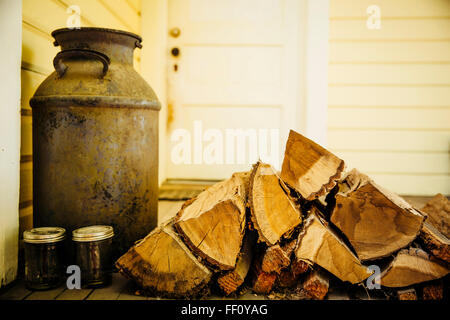 Firewood logs on patio Stock Photo