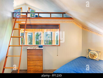 Loft bed in modern bedroom Stock Photo