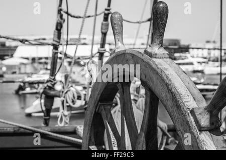 Steering wheel of an old sailing vessel, close up Stock Photo