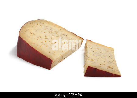 Portion Farmers Leiden cumin cheese on white background Stock Photo