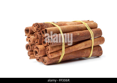Bundle of Cinnamon sticks on white background Stock Photo