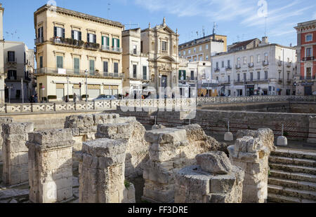 Part of the remains of the Roman Amphitheatre and buildings around Piazza Sant Oranzo, Lecce, Puglia, Italy Stock Photo