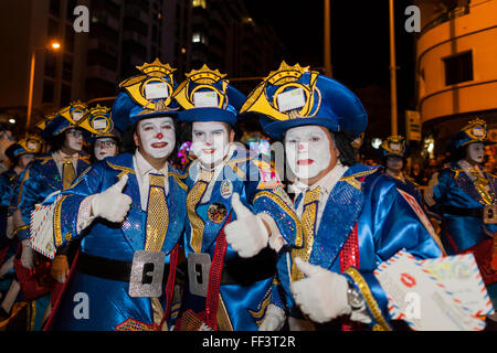 Characters, dancers and floats at the opening parade of the Carnaval de Santa Cruz de Tenerife. Thousands of people in groups of Stock Photo