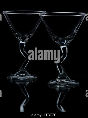 Two martini glasses on black background Stock Photo