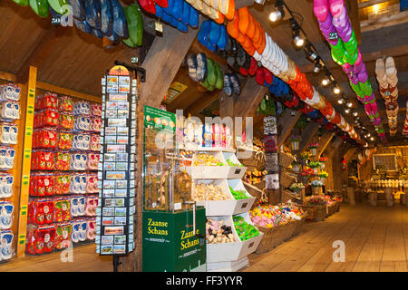 Tourist gift shop with wooden / wood souvenir clogs for sale to tourists and visitors. Zaanse Schans, Holland, Netherlands Stock Photo