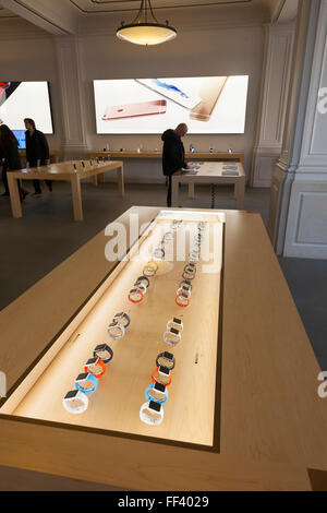 Smartwatch / watch display cabinet case containing smart watches for sale at Apple computer store, Amsterdam Netherlands Holland Stock Photo