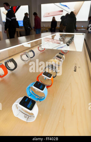 Smartwatch / watch display cabinet case containing smart watches for sale at Apple computer store, Amsterdam Netherlands Holland Stock Photo