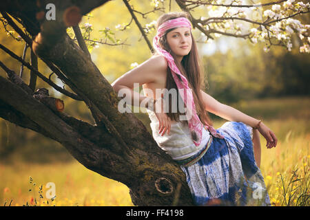 Beautiful young hippie woman posing . Summer light portrait Stock Photo