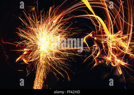 Yellow Color Fireworks Light Up Night Sky Stock Photo