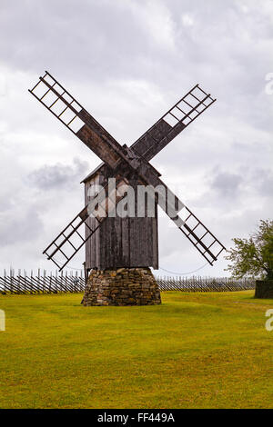 Old wooden windmill at farm on Estonian island Saaremaa Stock Photo