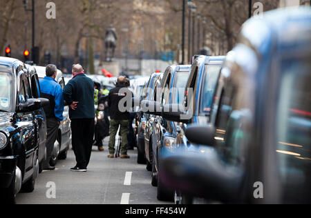 London UK 10 February 2016 Thousands Taxi drivers bring traffic to standstill with Whitehall demonstration, by United Cabbies Group, against Uber. Black cab drivers brings traffic to a standstill in Westminster with a protest outside Downing Street this afternoon - saying they are battling to defend their livelihoods. Credit:  Dinendra Haria/Alamy Live News Stock Photo