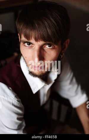 Headshot Modern Portrait of Brutal Bearded Man Looking in Camera. Selective Focus. Stock Photo