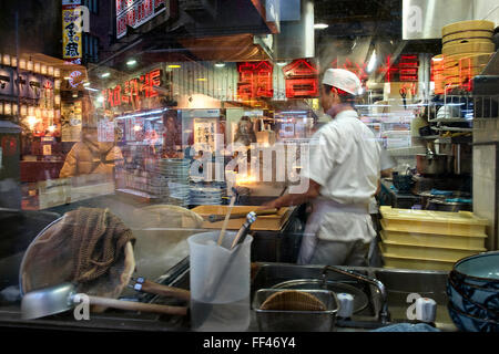 Japan, Honshu island, Kanto, Tokyo, street reflections at night. Stock Photo