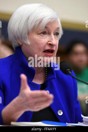 Washington, DC, USA. 10th Feb, 2016. U.S. Federal Reserve Chairwoman Janet Yellen testifies before the Committee on Financial Services of the U.S. House of Representatives on Capitol Hill in Washington, DC, the United States, Feb. 10, 2016. Janet Yellen on Wednesday signals that the Fed still keeps door open to further interest rate hikes, but flagging risks that could delay any further moves. Credit:  Yin Bogu/Xinhua/Alamy Live News Stock Photo