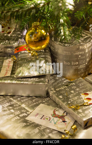 Gifts beneath Christmas tree. Stock Photo
