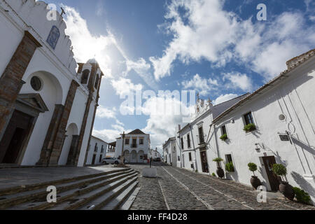 The pillory of Monsaraz across from the square from the Parochial church of Nossa Senhora da Lagoa, Portugal Stock Photo