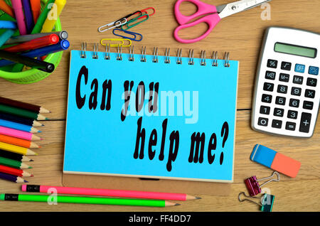 Can you help me written on notepad Stock Photo