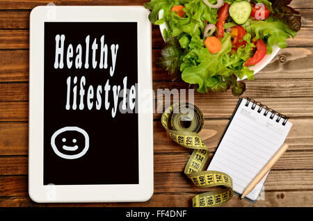 Healthy lifestyle words on digital tablet