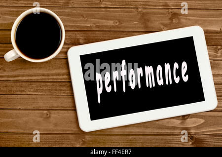 Performance word on digital tablet Stock Photo