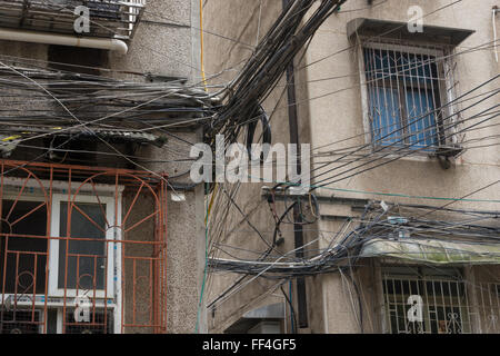 Messy electrical wiring in Xiangtan, Hunan, China Stock Photo