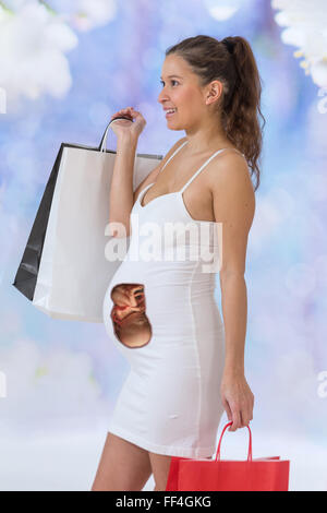 portrait of an Asian Pregnant woman holding paper bag, Stock Photo