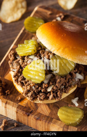 Homemade Loose Meat Tavern Sandwich with Onion and Pickle Stock Photo