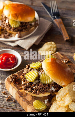 Homemade Loose Meat Tavern Sandwich with Onion and Pickle Stock Photo