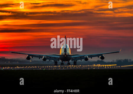 Aircraft at Sunrise and Sunset Stock Photo